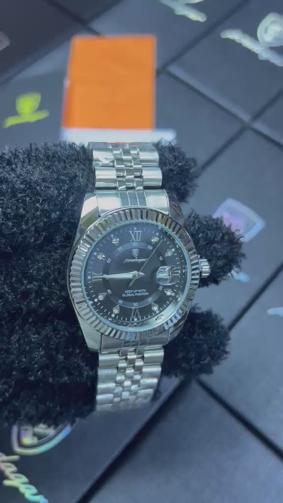 Video POEDAGAR 910B negro con esfera negra y caja plata visto desde otro ángulo